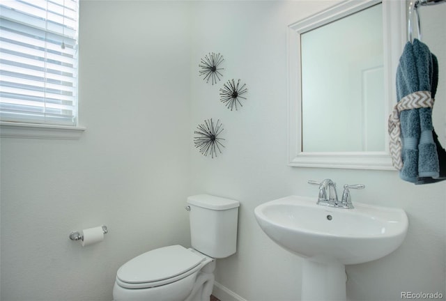 bathroom featuring sink and toilet