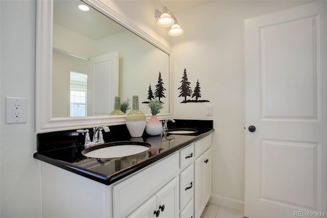 bathroom with vanity and tile patterned floors