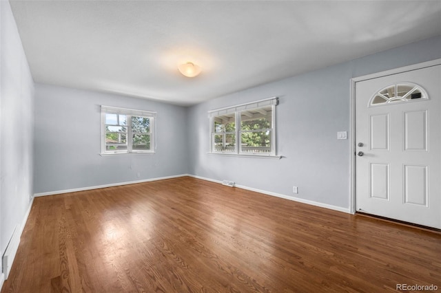 6749 S Foresthill St, Littleton, CO 80120 - foyer featuring wood finished floors and baseboards