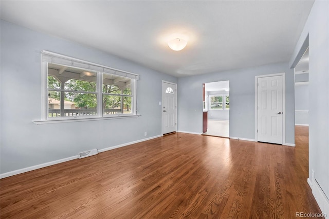 6749 S Foresthill St, Littleton, CO 80120 - empty room with wood finished floors and baseboards