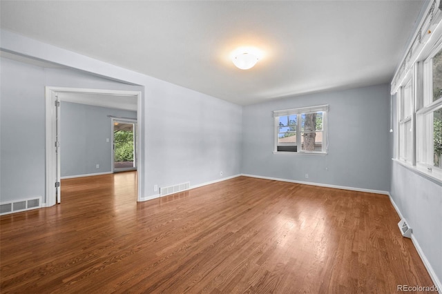 6749 S Foresthill St, Littleton, CO 80120 - unfurnished room with plenty of natural light and wood finished floors