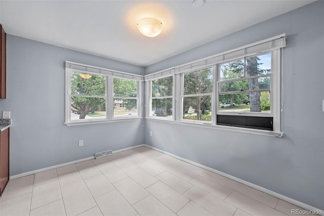 6749 S Foresthill St, Littleton, CO 80120 - unfurnished dining area featuring healthy amount of natural light