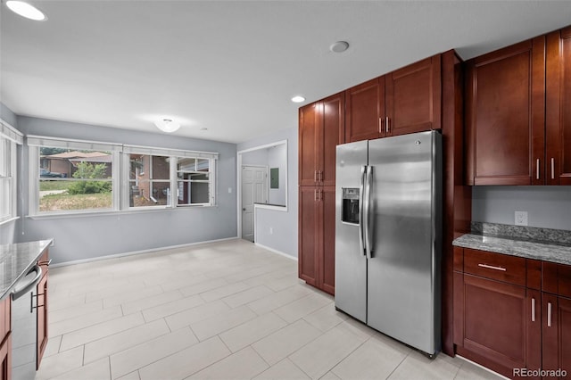 6749 S Foresthill St, Littleton, CO 80120 - kitchen featuring stainless steel refrigerator with ice dispenser, light stone countertops, recessed lighting, and reddish brown cabinets