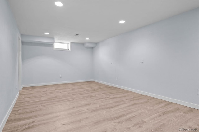 6749 S Foresthill St, Littleton, CO 80120 - below grade area featuring recessed lighting and light wood-style flooring