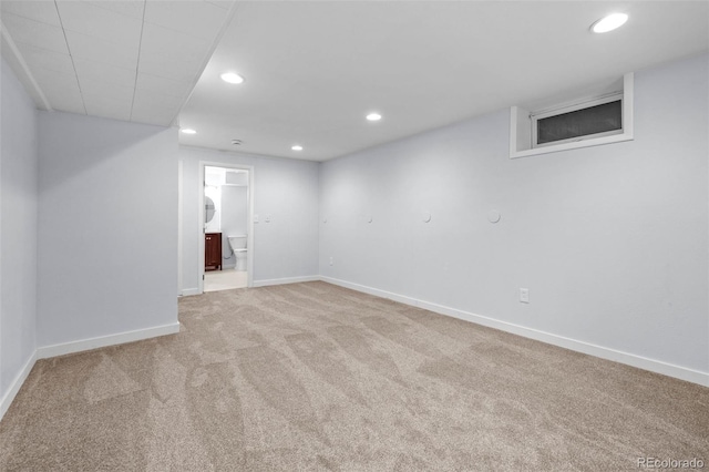 6749 S Foresthill St, Littleton, CO 80120 - finished below grade area with light colored carpet and recessed lighting