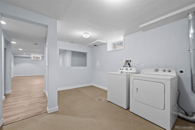 6749 S Foresthill St, Littleton, CO 80120 - laundry room with washing machine and dryer and light colored carpet