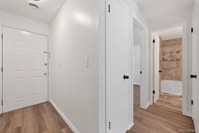 225 E 8th Ave Unit A2, Longmont, CO 80504 - hallway with light wood-type flooring and baseboards