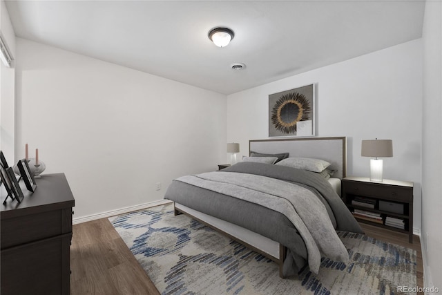 225 E 8th Ave Unit A2, Longmont, CO 80504 - bedroom featuring wood finished floors and baseboards