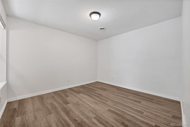225 E 8th Ave Unit A2, Longmont, CO 80504 - empty room featuring wood finished floors and baseboards