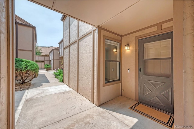 225 E 8th Ave Unit A2, Longmont, CO 80504 - view of exterior entry with stucco siding