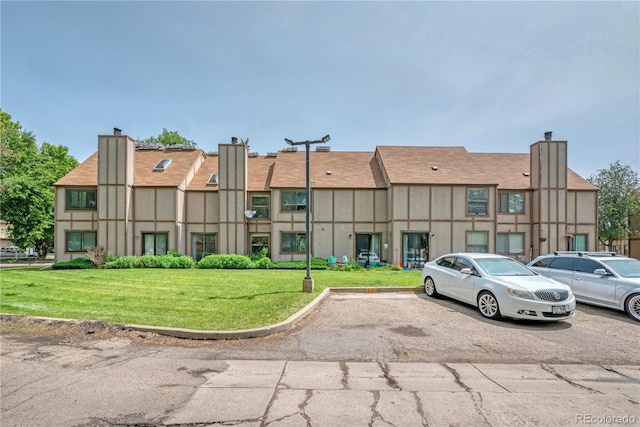 225 E 8th Ave Unit A2, Longmont, CO 80504 - view of property with uncovered parking
