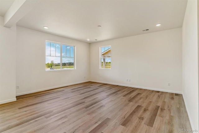 455 S Salida St, Aurora, CO 80017 - unfurnished room featuring light wood-style flooring, recessed lighting, and baseboards
