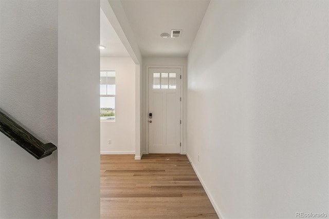 455 S Salida St, Aurora, CO 80017 - foyer entrance with light wood-type flooring and baseboards
