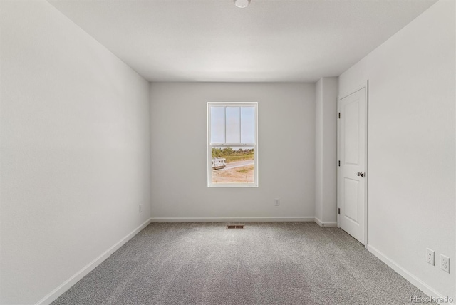 455 S Salida St, Aurora, CO 80017 - spare room with carpet floors and baseboards