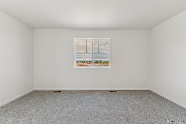 455 S Salida St, Aurora, CO 80017 - carpeted spare room with baseboards