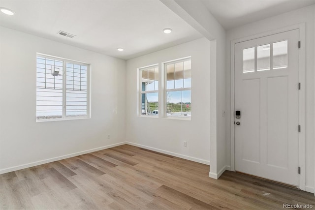 455 S Salida St, Aurora, CO 80017 - foyer featuring light wood-style floors, baseboards, and recessed lighting