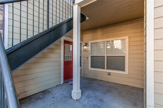 doorway to property with a patio area