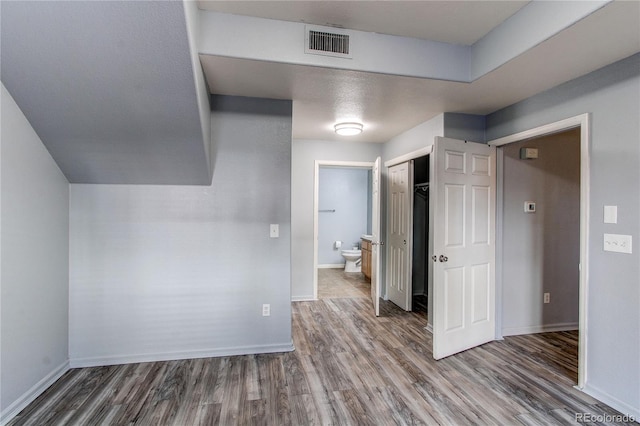 interior space with dark hardwood / wood-style floors