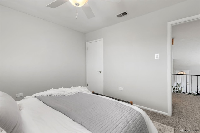 carpeted bedroom with ceiling fan