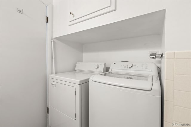 laundry room with washer and clothes dryer