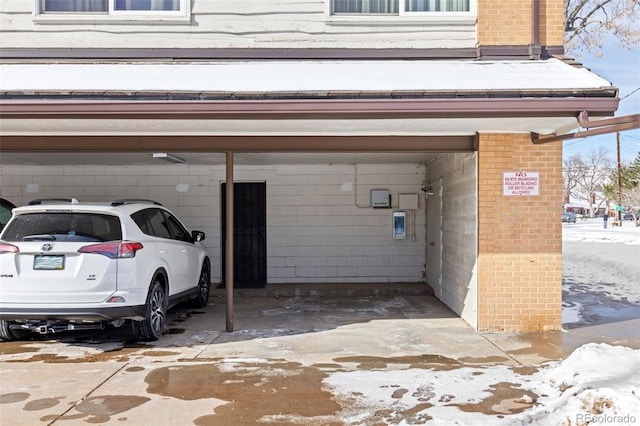 view of snow covered garage