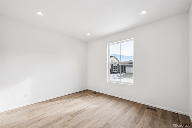 empty room featuring light wood-type flooring