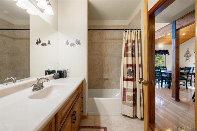 167 Wapiti Ct, Canon City, CO 81212 - bathroom with vanity, shower / tub combo, and a chandelier