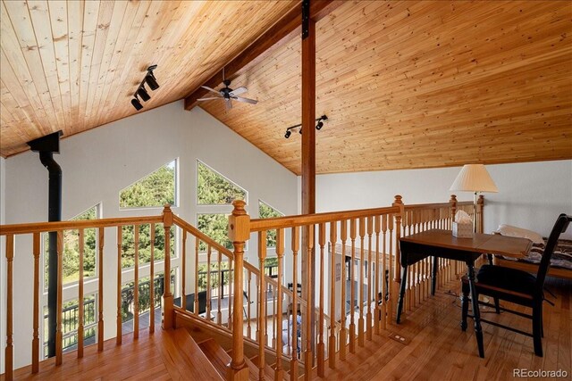 167 Wapiti Ct, Canon City, CO 81212 - stairway with wooden ceiling, a ceiling fan, wood finished floors, rail lighting, and beam ceiling