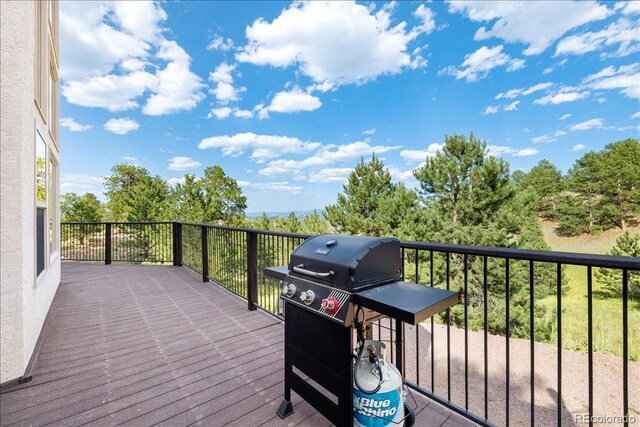 167 Wapiti Ct, Canon City, CO 81212 - wooden terrace featuring a grill