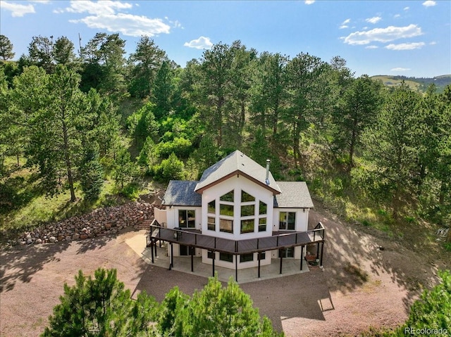 167 Wapiti Ct, Canon City, CO 81212 - rear view of property with a patio area, a deck, and a view of trees
