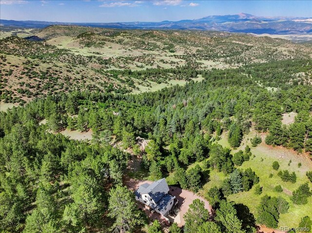 167 Wapiti Ct, Canon City, CO 81212 - aerial view of property and surrounding area featuring mountains and a forest