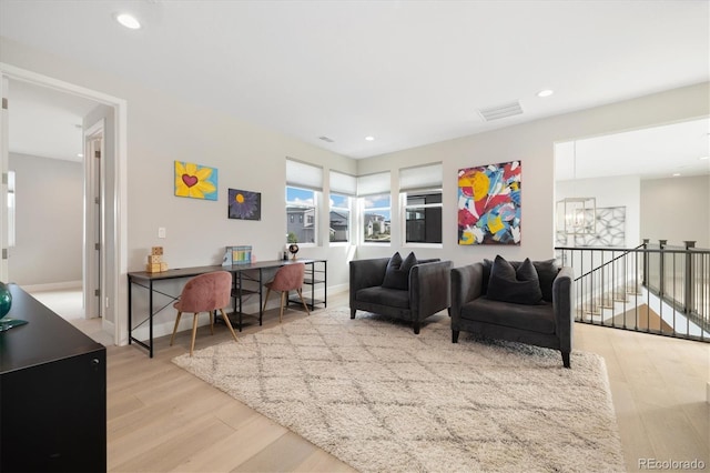 2221 Rim Ridge Dr, Castle Pines, CO 80108 - living area featuring wood finished floors and recessed lighting