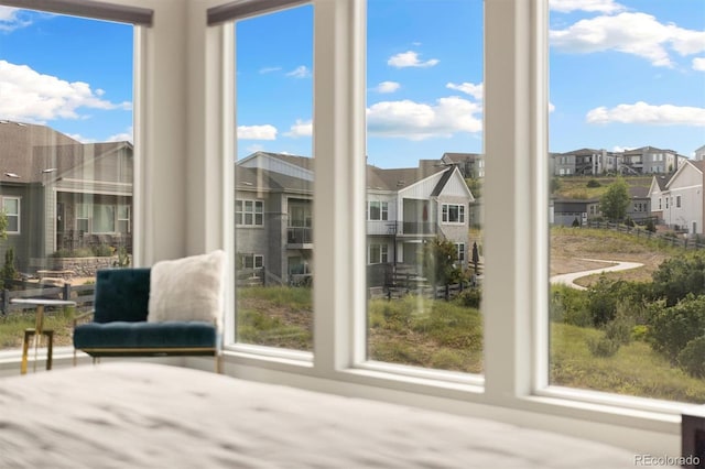 2221 Rim Ridge Dr, Castle Pines, CO 80108 - sunroom featuring a residential view
