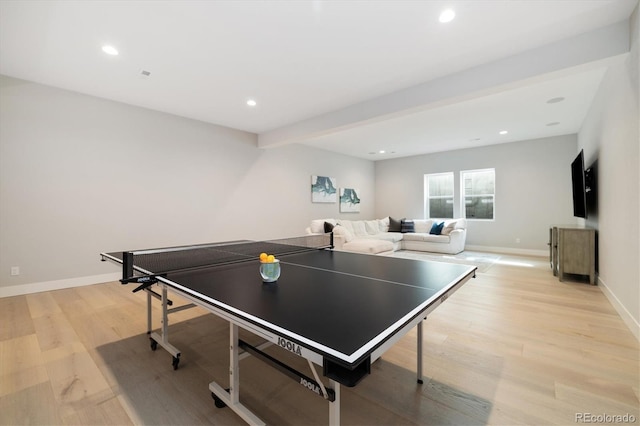 2221 Rim Ridge Dr, Castle Pines, CO 80108 - recreation room with light wood-style floors and recessed lighting