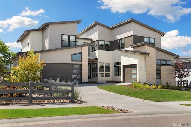 2221 Rim Ridge Dr, Castle Pines, CO 80108 - modern home with concrete driveway and a garage