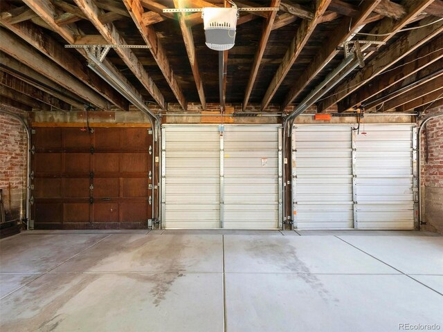 garage featuring a garage door opener