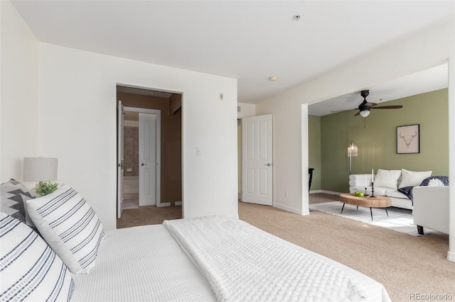 bedroom featuring carpet floors, a ceiling fan, and baseboards