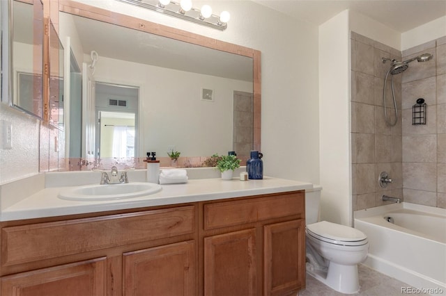 bathroom with toilet, visible vents, vanity, and shower / bath combination