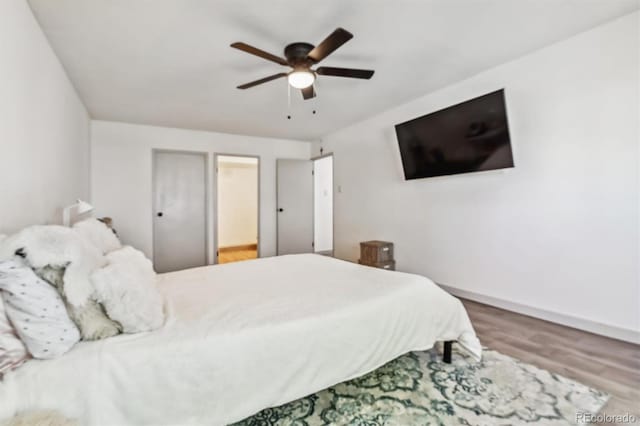 bedroom featuring ceiling fan and hardwood / wood-style floors