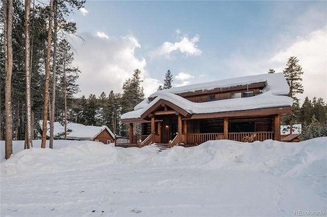 view of log cabin