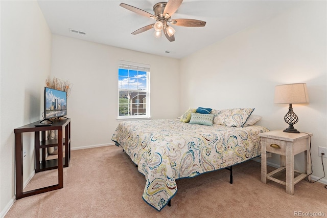 19316 W 84th Pl, Arvada, CO 80007 - bedroom with light colored carpet, baseboards, and ceiling fan