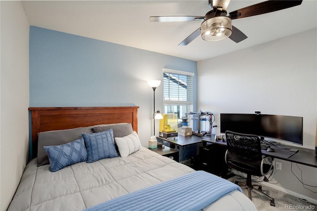 carpeted bedroom with ceiling fan