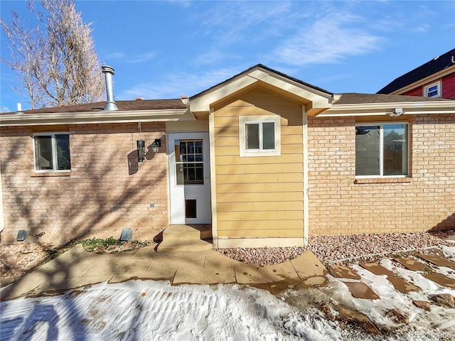 rear view of property featuring a patio area