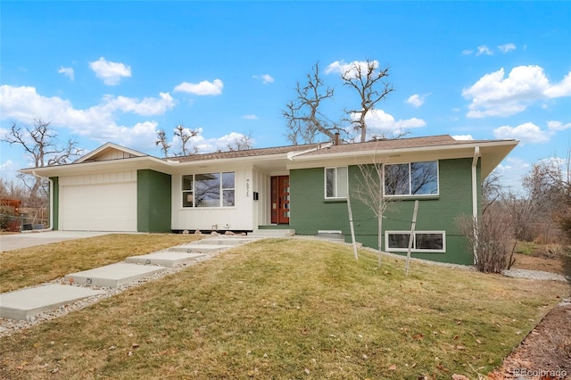 ranch-style house with a garage and a front lawn