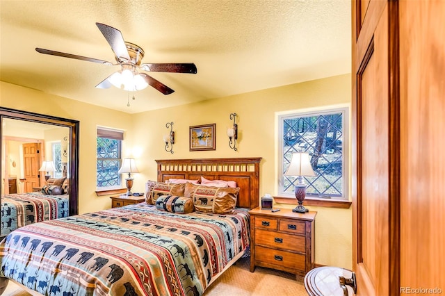 2891 Nugget Rd, Fairplay, CO 80440 - carpeted bedroom with a ceiling fan and a textured ceiling