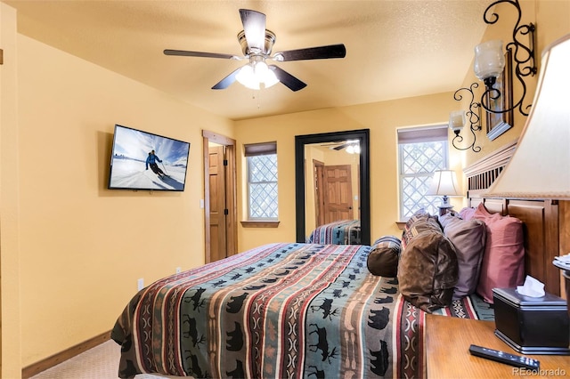 2891 Nugget Rd, Fairplay, CO 80440 - bedroom with baseboards and ceiling fan