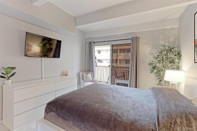 bedroom featuring a textured ceiling