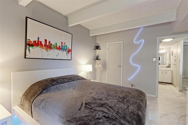 bedroom with beam ceiling, a textured ceiling, and light tile patterned floors