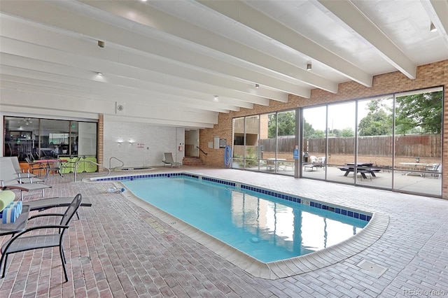 view of pool featuring a patio area