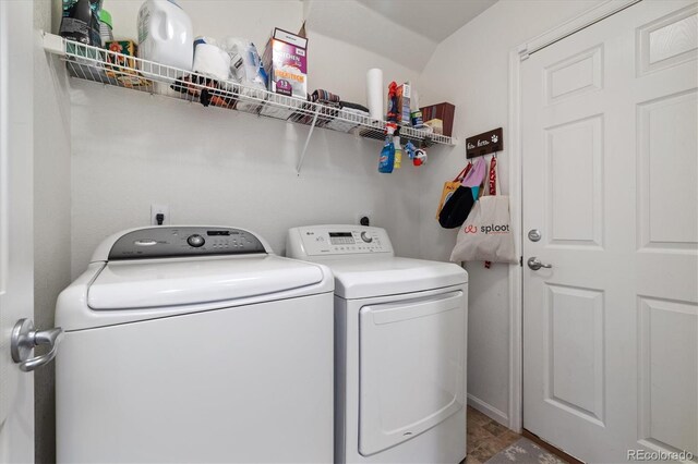 washroom with separate washer and dryer